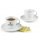 Elegante set de taza Encantada de porcelana con plato.