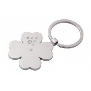 Llavero metálico con pedrería y placa en forma de trébol