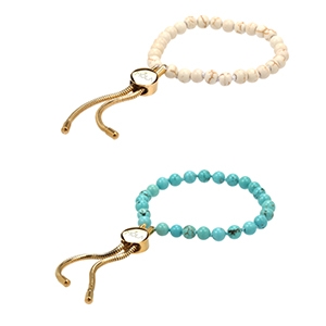 Pulsera de acero cubierto de oro y gemas naturales