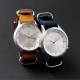 Reloj de pulso unisex, caja metálica y correa de piel colores: azul y café