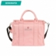 Bolso de mano fabricado en lona de algodón