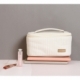 Bolsa cosmetiquera fabricada en curpiel y poliéster
